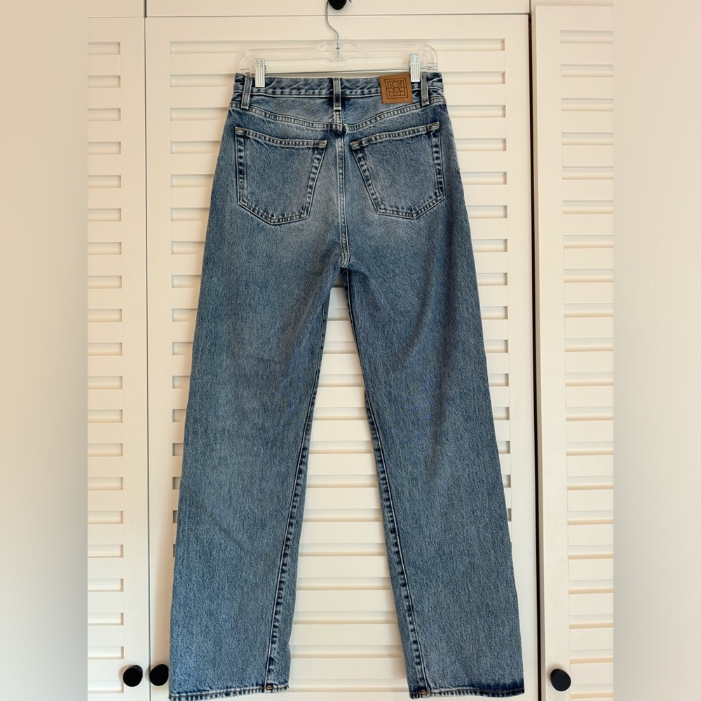 TOTEME twisted seam denim - in worn blue
